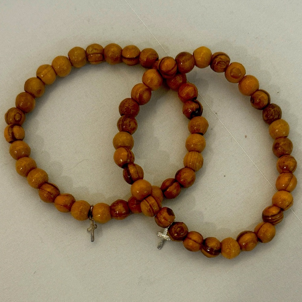 Beaded wood bracelet with tiny silver cross.  💕